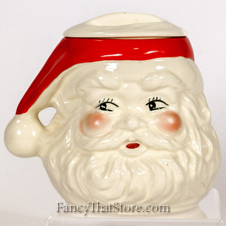 This “Rosey Cheeks” Santa Cookie Jar was made by Stanford Ware Pottery. There aren’t any chips, cracks or other major flaws. 9 x 9 x 8 in.